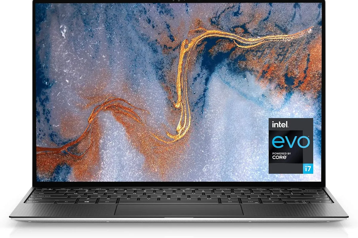 A thin ultrabook laptop on a coffee shop table