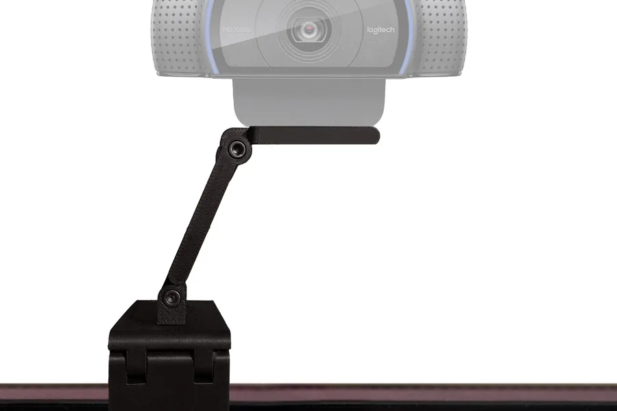 Streaming setup with webcam, microphone, and ring light